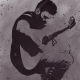 Acoustic musician playing guitar