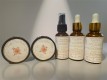 Simply serene natural skincare set displayed with four essential oil-based products.
